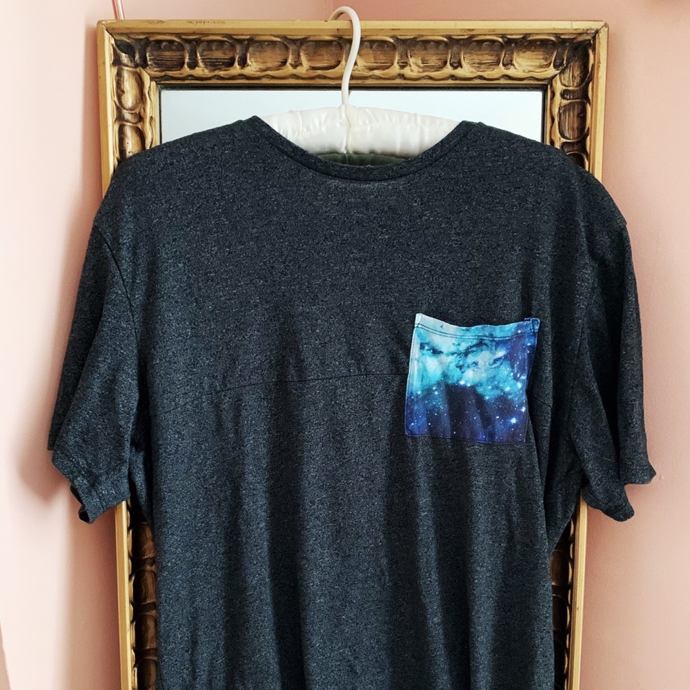On the Byas Mens large cosmic galaxy tee shirt